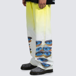 HUMAN EYES BAGGY PANTS YELLOW